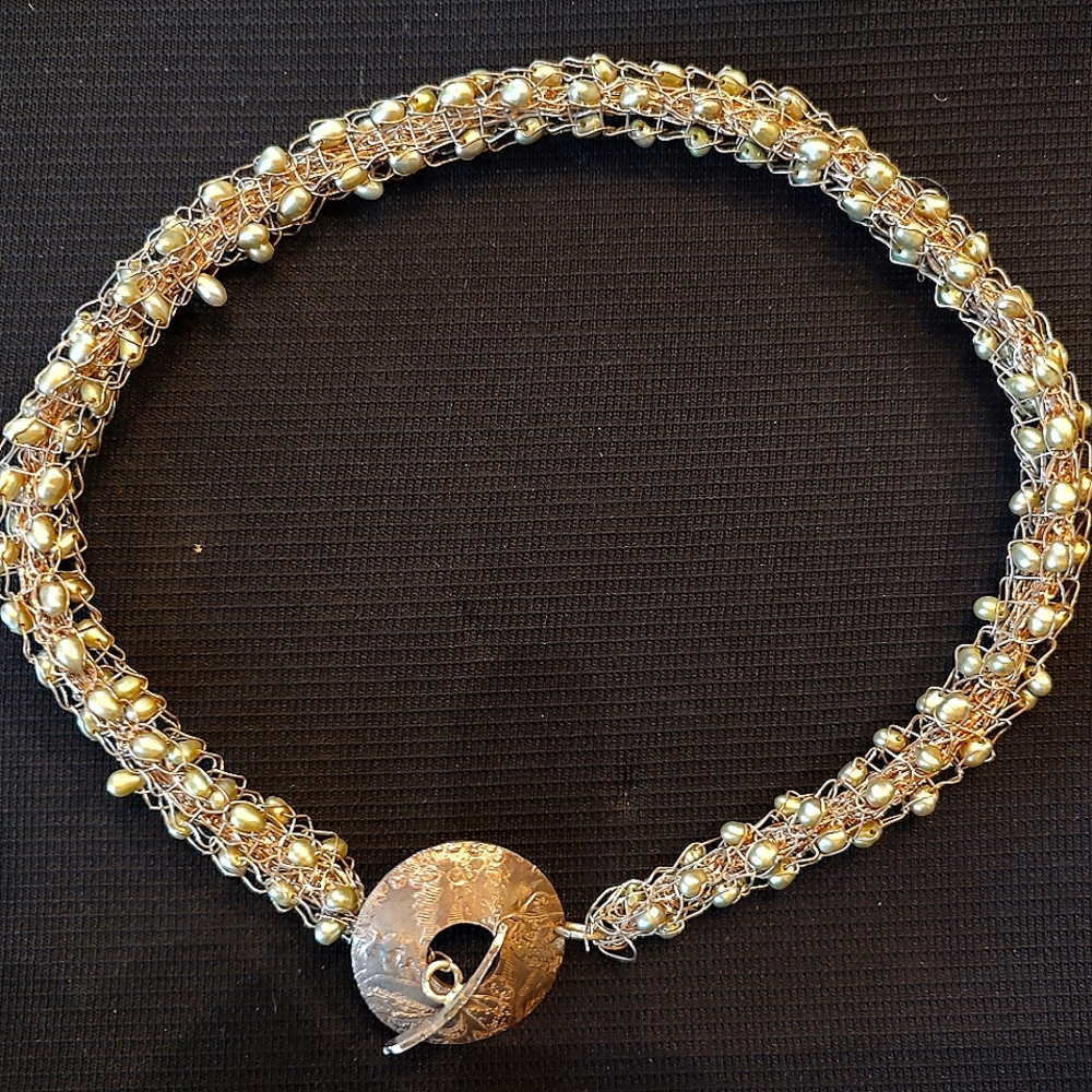 Custom argentum crocheted necklace